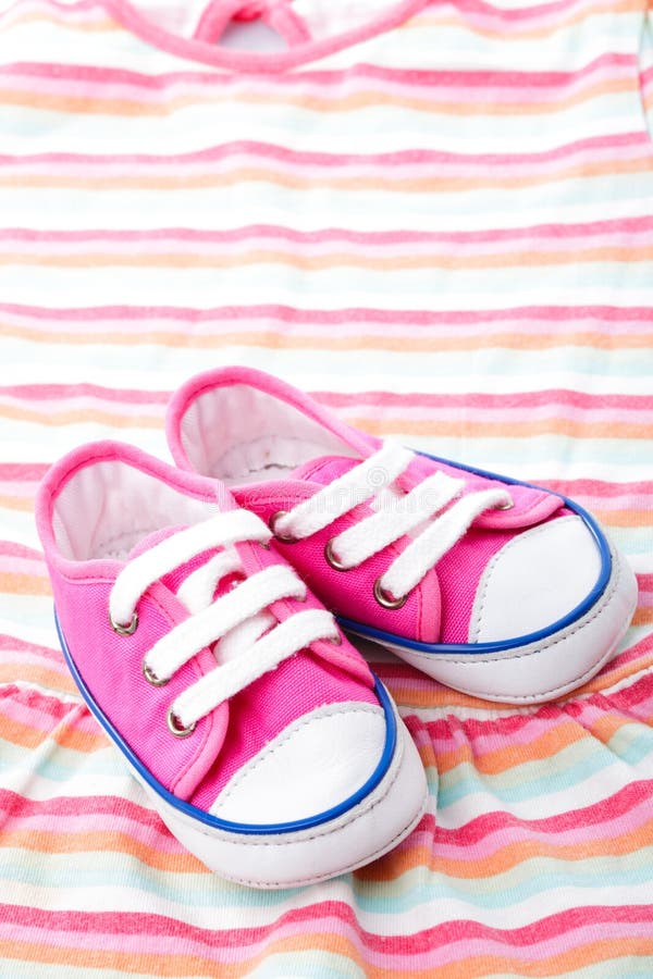 Pink baby shoes royalty free stock image