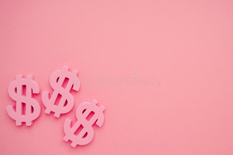 Pink background wiith dollar symbols , money sign top view