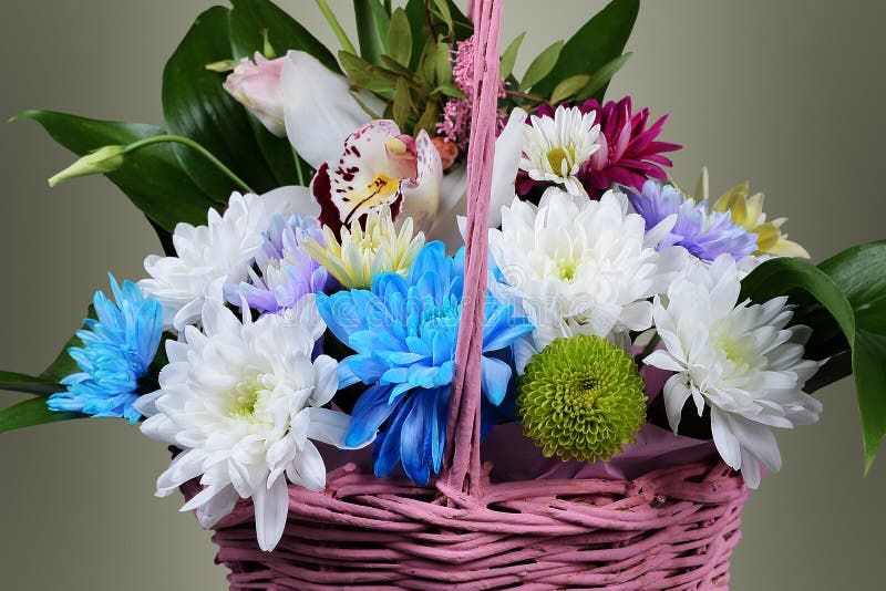 Pink basket with flowers stock image. Image of background - 87371573