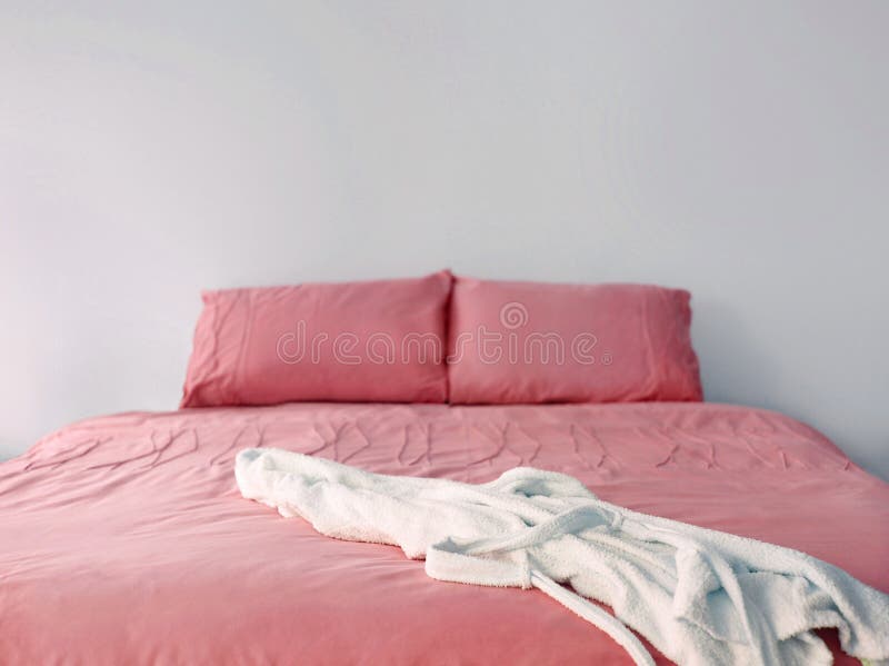 Pink bedding on double bed stock image. Image of furniture 78730269