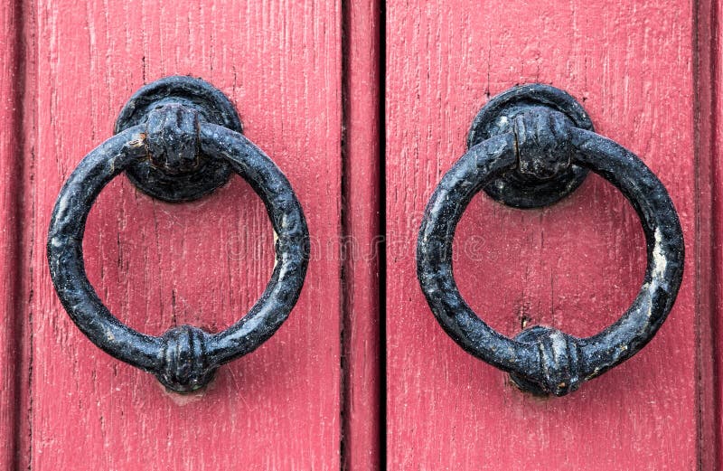 Pink behind doorknockers royalty free stock photo Pink behind doorknockers royalty free stock photo