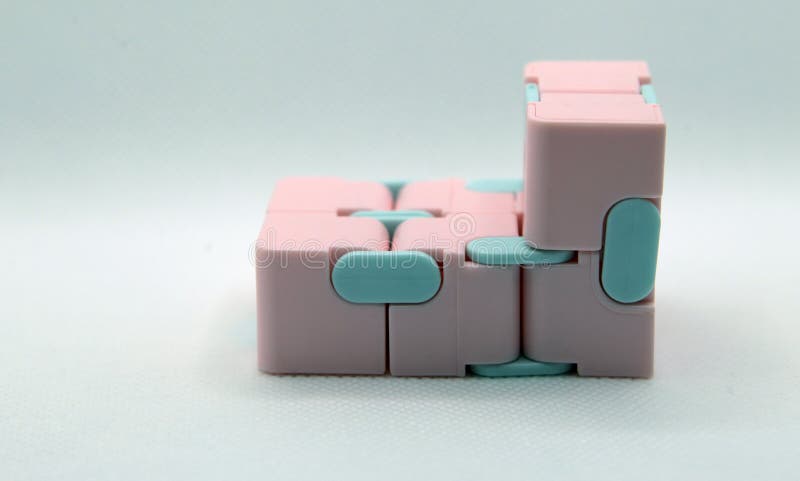 Pink and blue infinity cube with white background royalty free stock photos