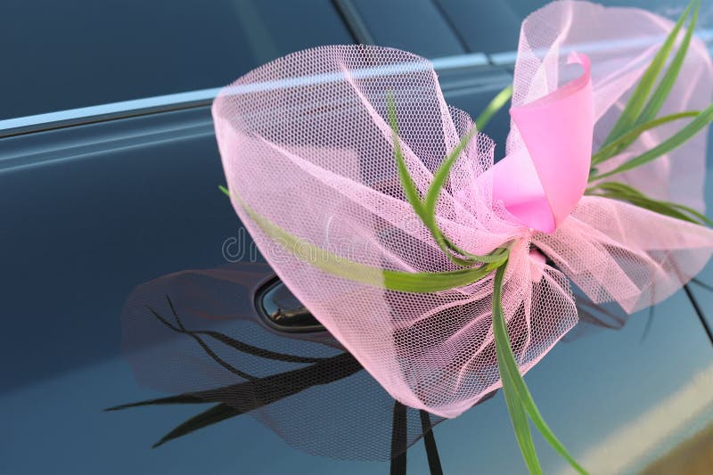 Pink bow on car door stock photo. Image of festive, grass - 14624308