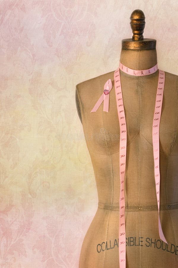 Pink breast cancer ribbon on mannequin