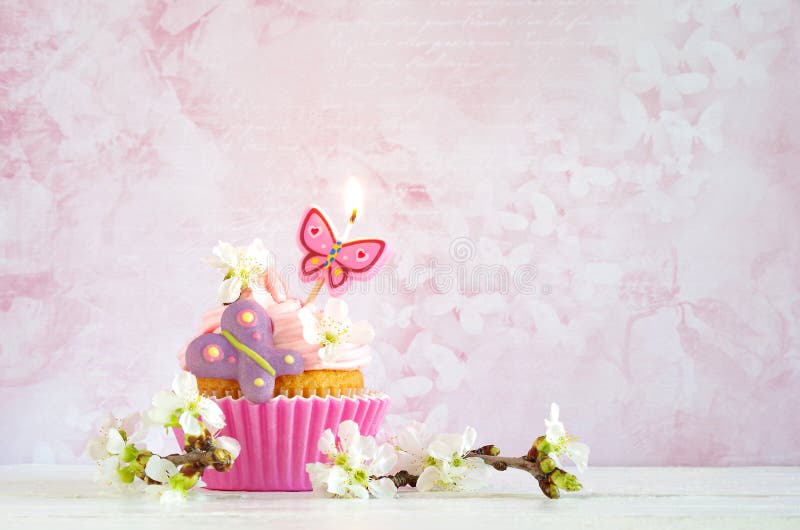Pink Buttercream Cupcake with Flower and Candle Stock Photo Image of