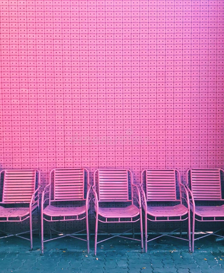 Pink Chairs in Front of Pink Pastel Wall Stock Photo - Image of decor