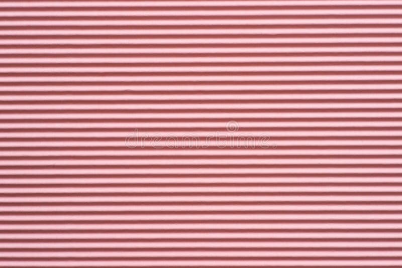 Pink corrugated paper background texture