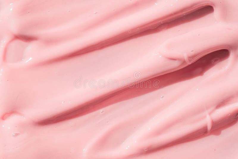 Pink color cosmetic cream lotion moisturizer smear smudge sample. Beauty cream texture background. Skin care product