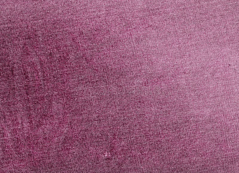 Close Up Surface Background Of Pink Jeans Fabric Texture. Stock