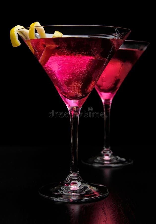 Two Cosmopolitan Cocktails in Traditional Martini Glasses with View To