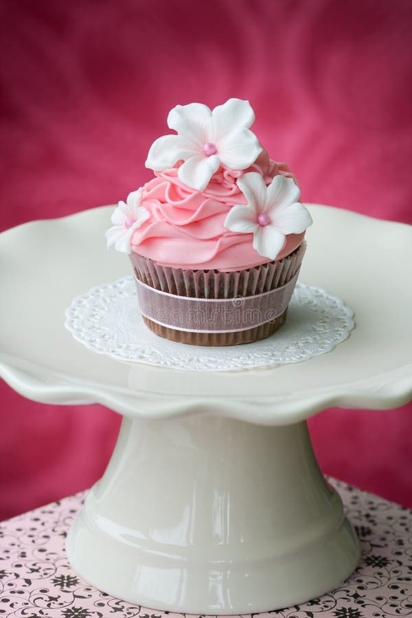 Pink Cupcake in a Teacup stock photo. Image of dessert 10852532