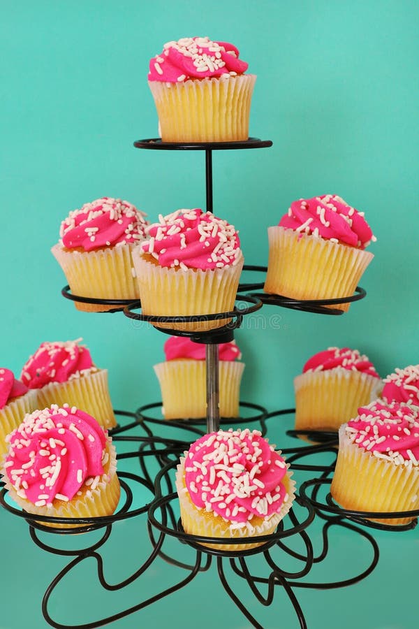 Pink Cupcakes On Aqua Background Stock Photo Image of pink