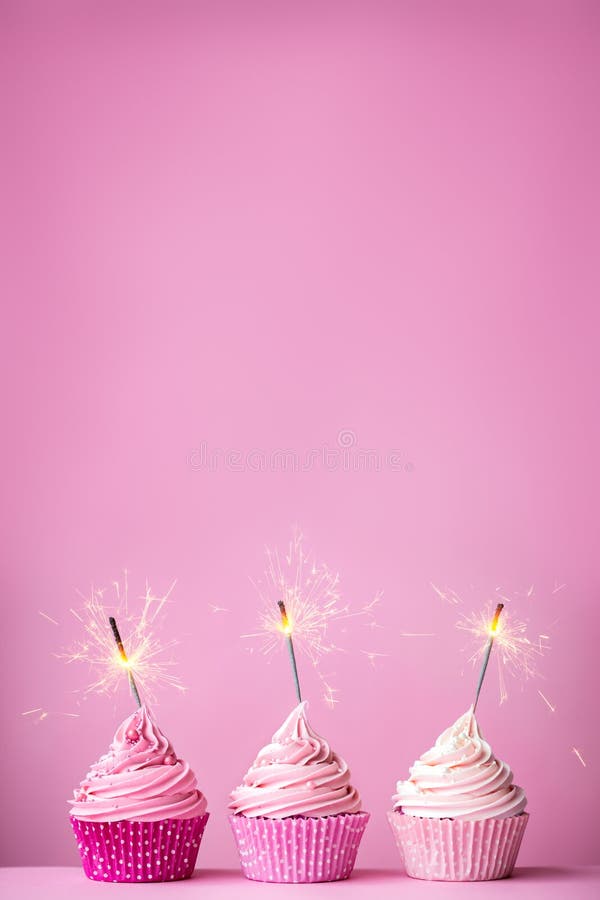 Pink cupcakes with sparklers