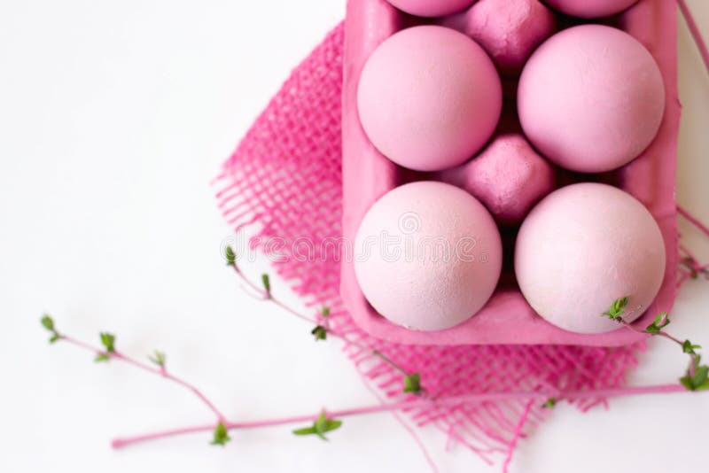 Pink Easter Eggs in Pink Box with Decoration, on White Background with