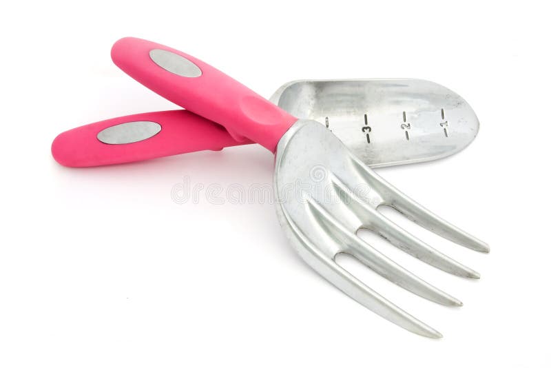 Pink garden tools over white