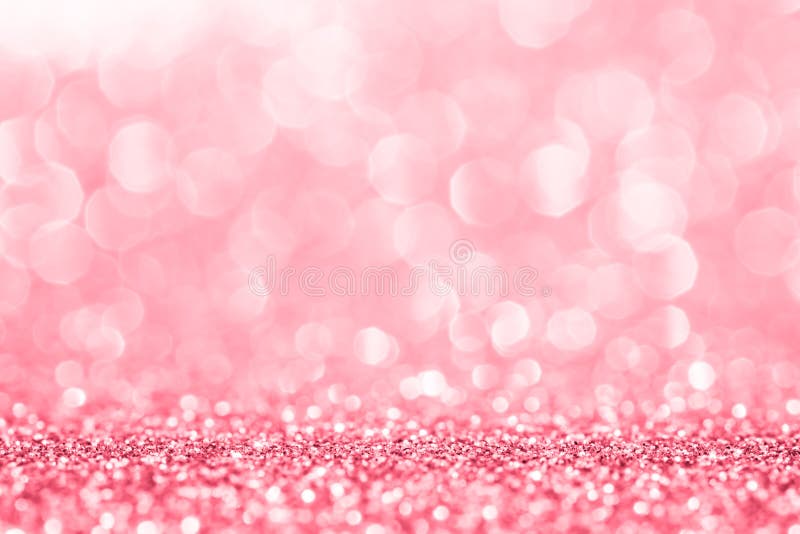 Download A Heart Made Of Gold Glitter On A Pink Background