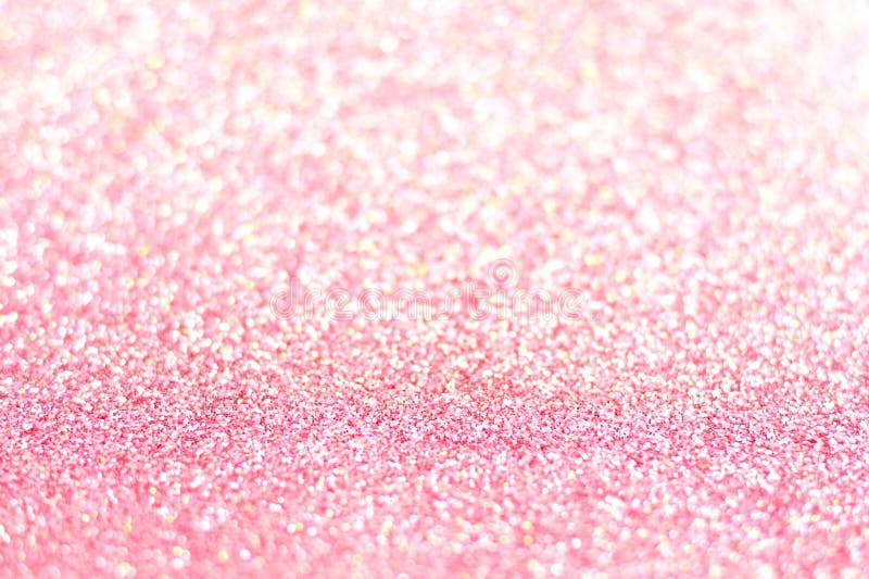 Pink glitter background with selective focus