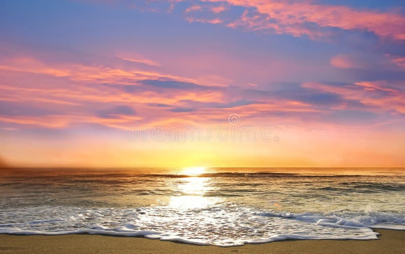 Pink gold sunset at sea  sunbeam reflection on water  ,cloudy  fluffy colored sky nature summer  landscape