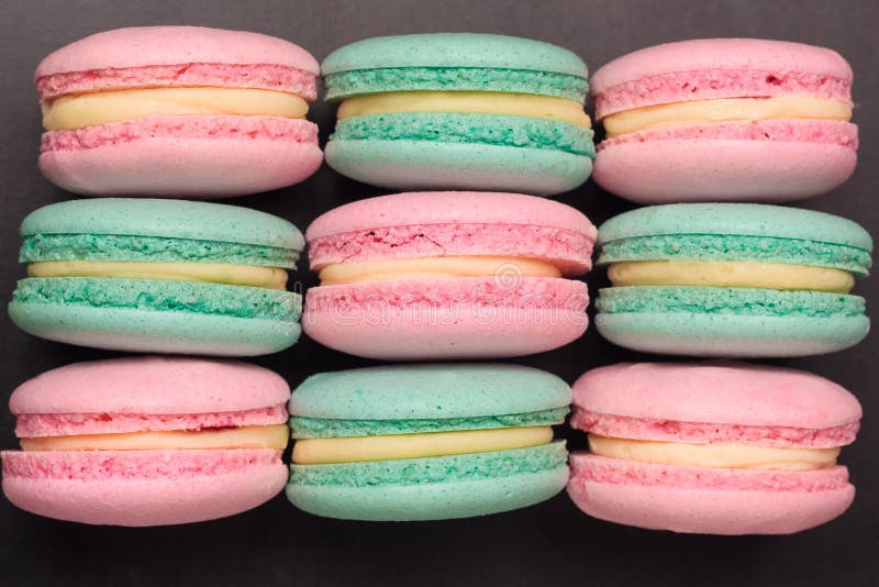 Pink and green colorful macaroons stock photo