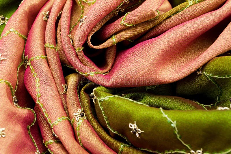 Pink and green satin textile