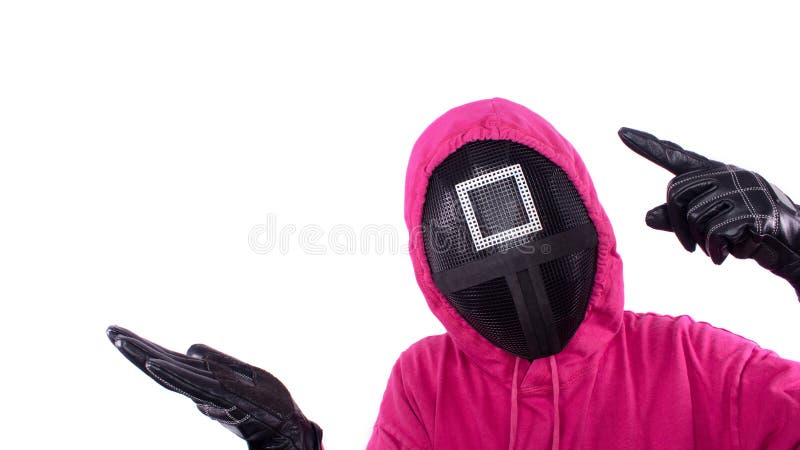 Pink Guard from Squid Game of Netflix show. Squid Game red guard holds hand up for text on white background. Space for text. South