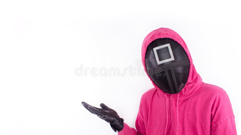 Pink Guard from Squid Game of new Netflix show. Squid Game red guard holds hand up for text on white background. Space for text.