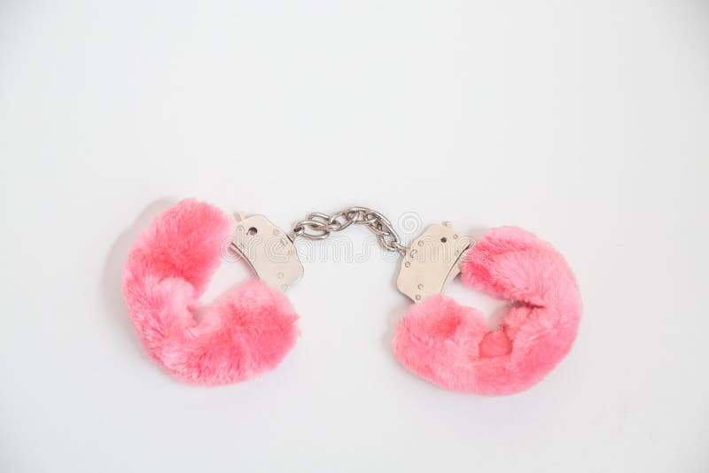 Pink handcuffs stock photo. Image of game, play, metal 49692016