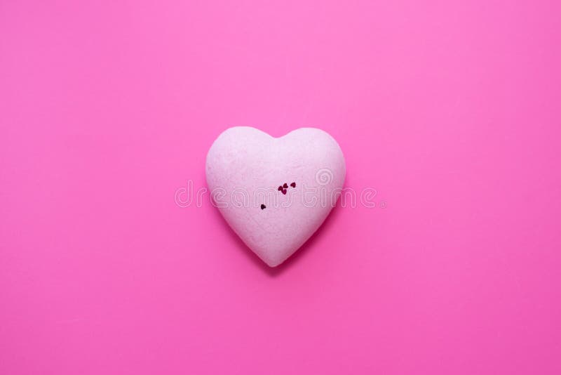 Pink heart on pink background. copy space. concept of love. day valentine, valentine`s day. wedding poscard. spa heart