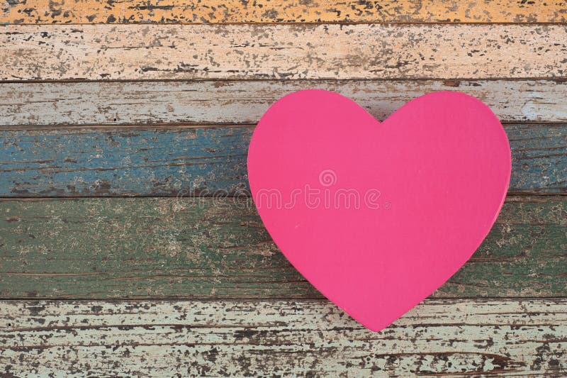 Pink Heart gift box on vintage wood table