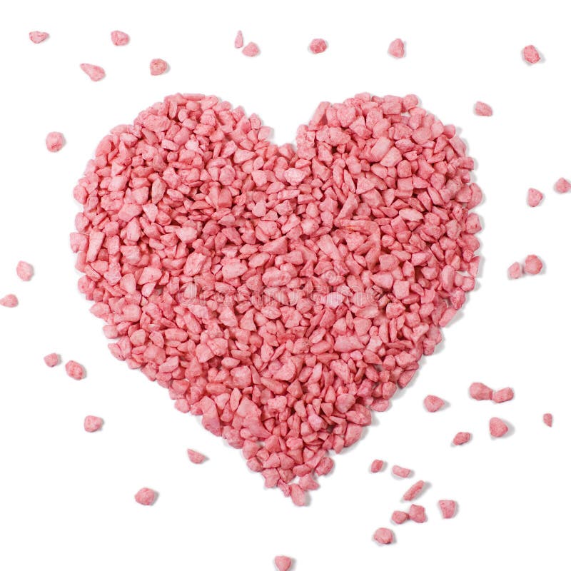 A pile of pink stones - bath salt forming a heart - love symbol, isolated on white. A pile of pink stones - bath salt forming a heart - love symbol, isolated on white.
