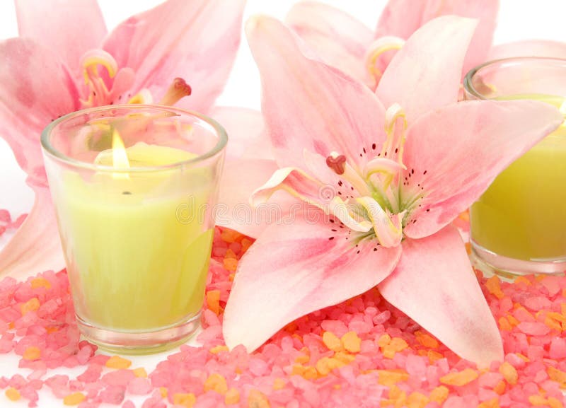 Pink lilies and candles stock photo. Image of green, salt 25418302
