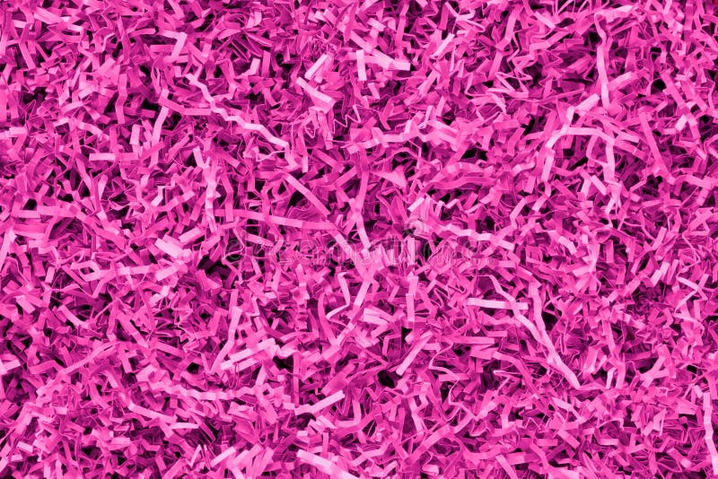 Pink and magenta shredded paper packaging material background