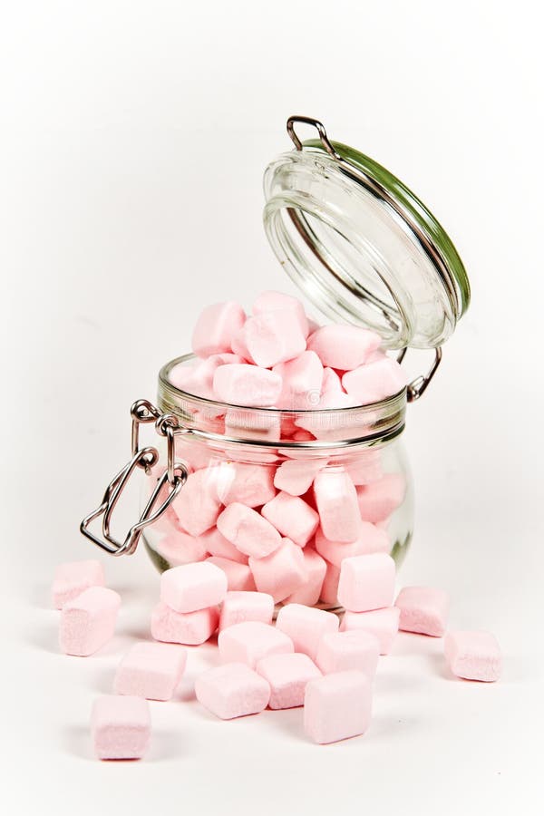 Pink Marshmallows in the Glass Jar, on White Background Stock Image