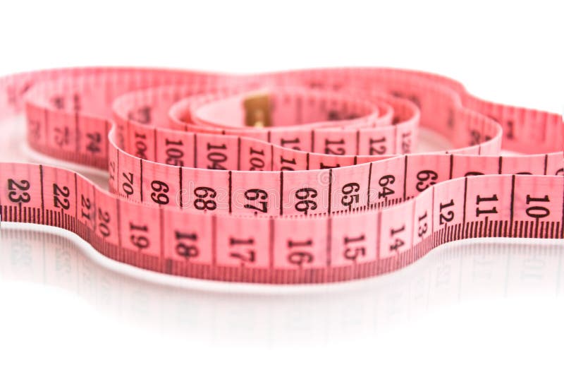 Pink measuring tape on white