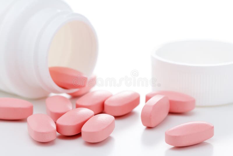 Pink Oval Pills Poured Out Of A White Bottle Stock Image Image of
