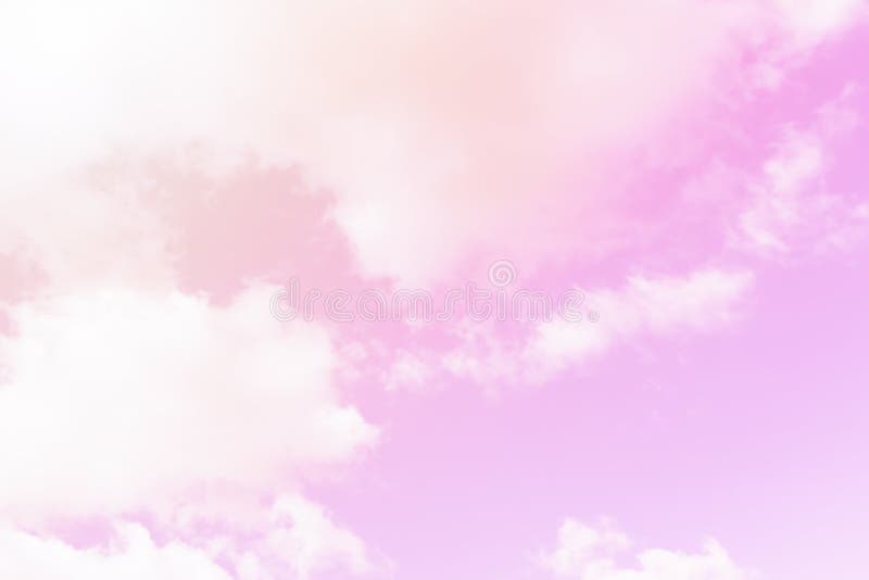 Pastel Sky Background. Pink Sky with Fluffy Clouds Stock Photo Image