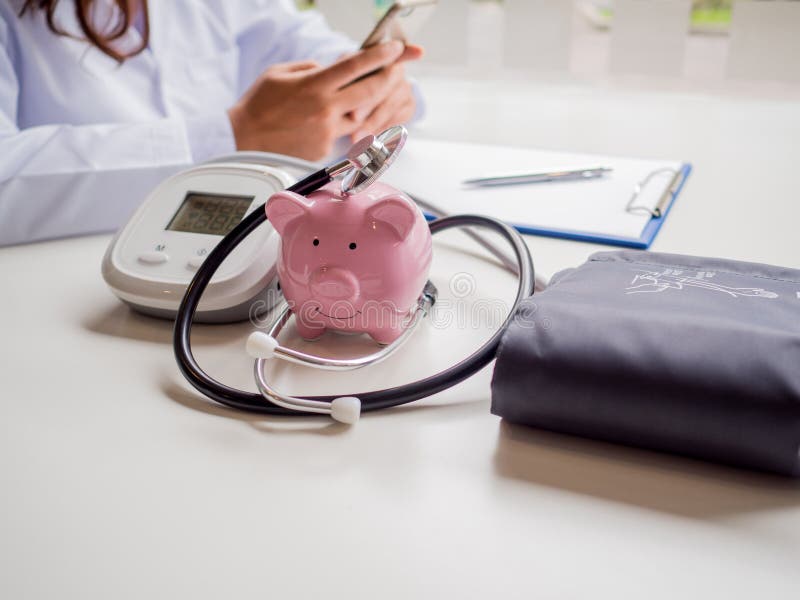 pink piggy bank doctor stethoscope pressure gauge saving money future plan health insurance concept pink piggy 161509998