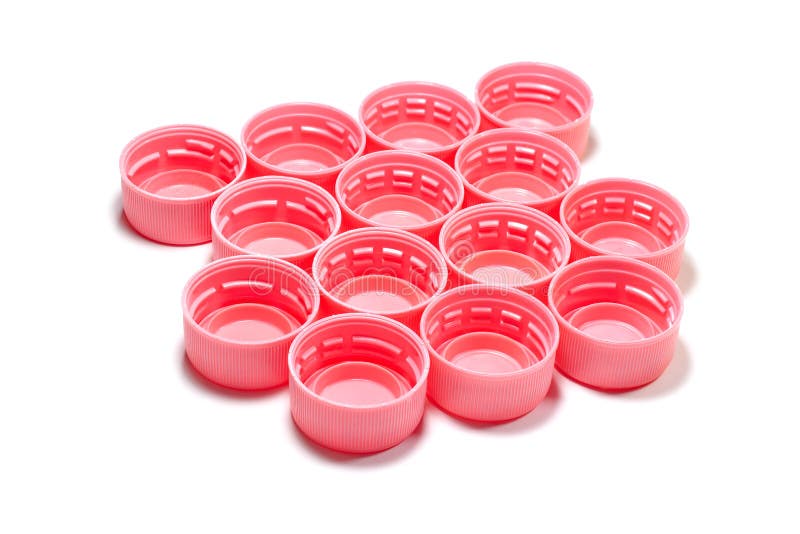 Pink plastic bottle caps stock photo. Image of alcohol 65802034
