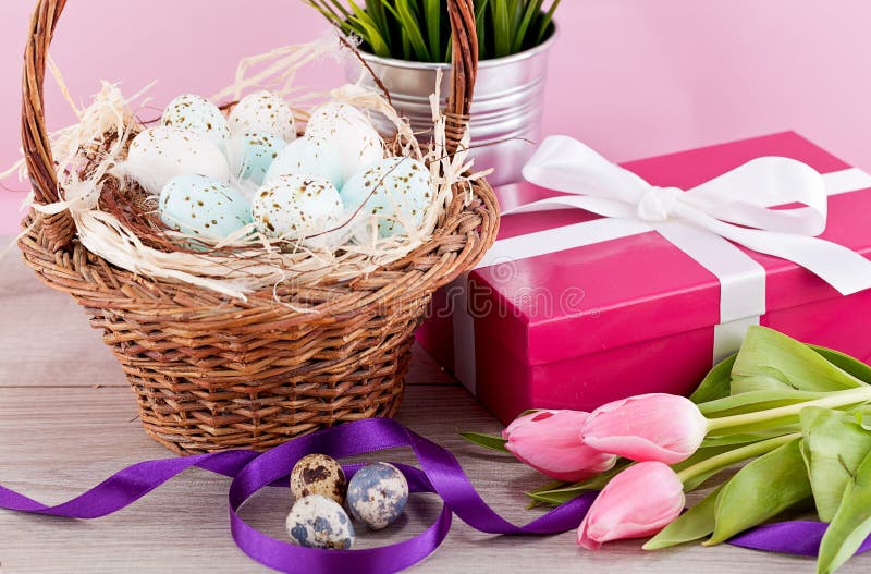 Pink present and colorful tulips festive easter decoration