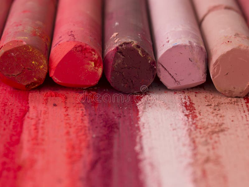 Pink and red artistic crayons