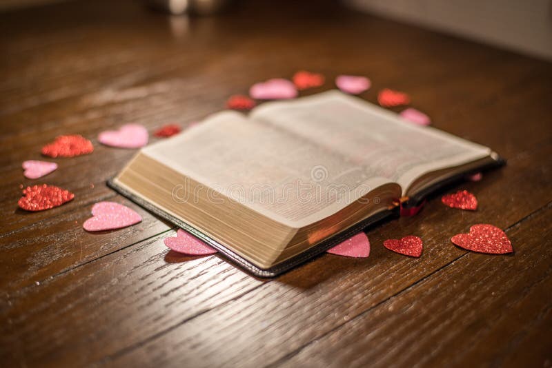 Valentines heart and bible on wooden table stock photo Valentines heart and bible on wooden table stock photo