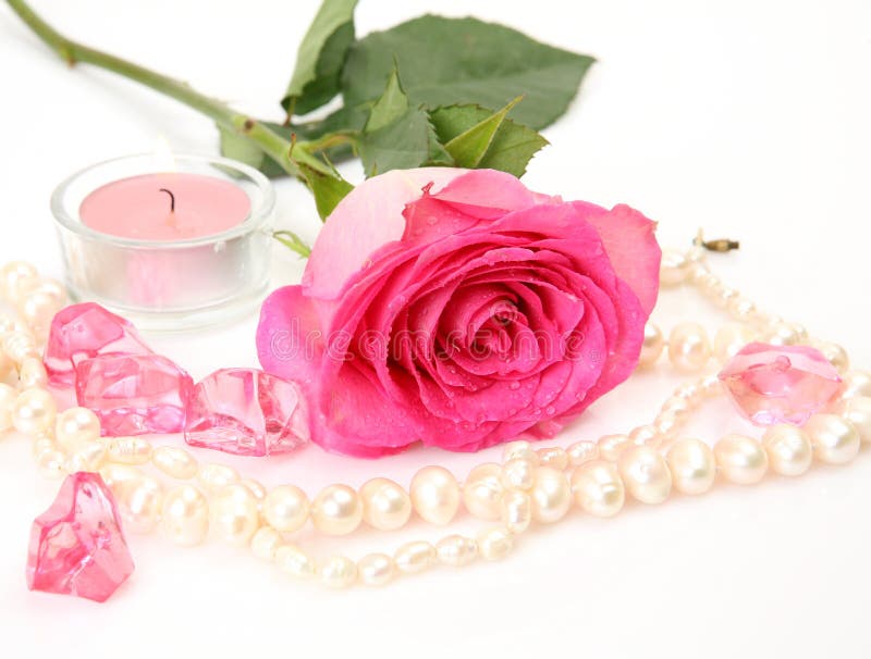Pink rose and candles