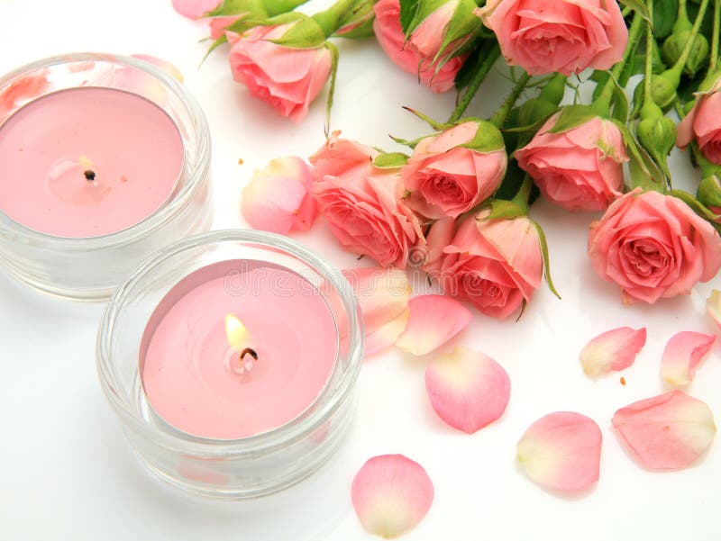 Pink roses and candles stock photo. Image of bouquet 25369754