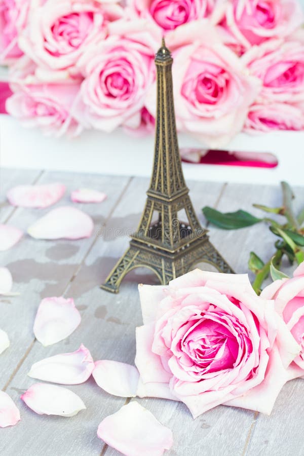 Pink Roses with Eiffel Tour on Table Stock Image - Image of color ...