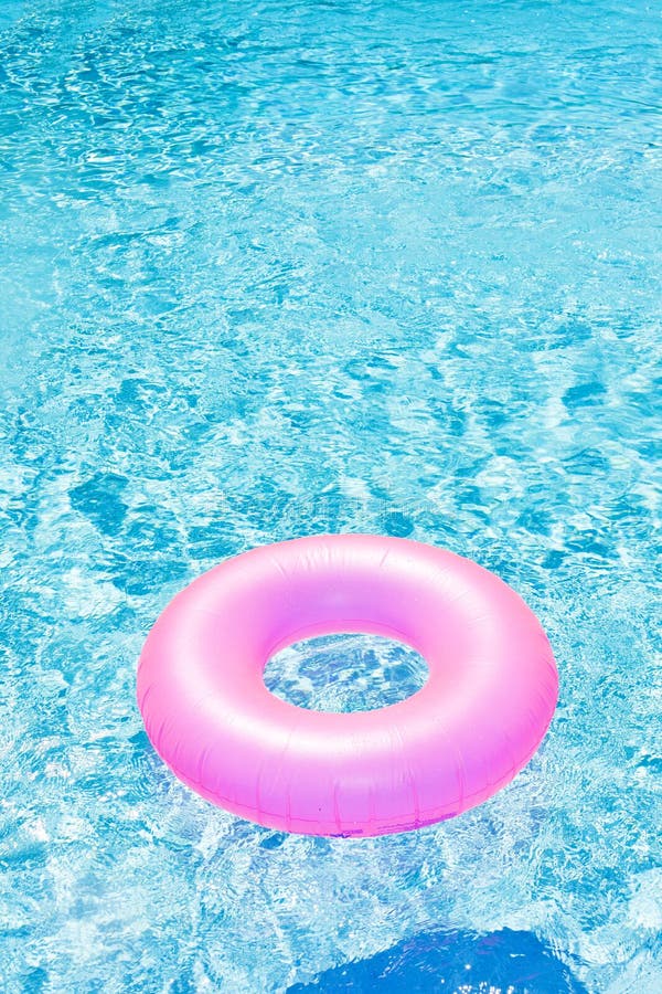 Floating pink rubber ring stock image. Image of light - 1583141