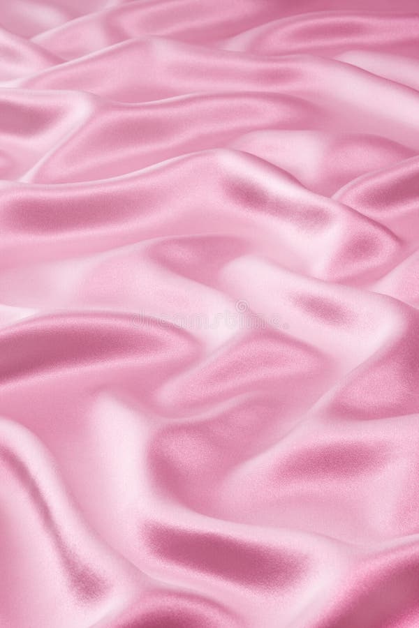Un morbido raso rosa materiale di sfondo con piccole pieghe.