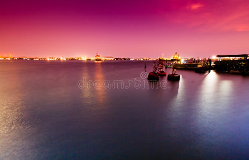 Pink sky sea port royalty free stock photos Pink sky sea port royalty free stock photos