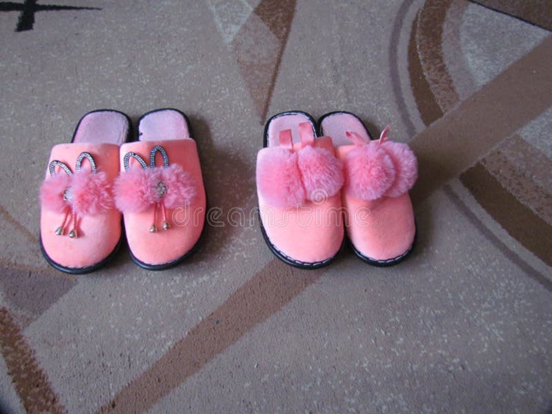 Pink Slippers on the Floor Carpet Stock Image - Image of carpet ...