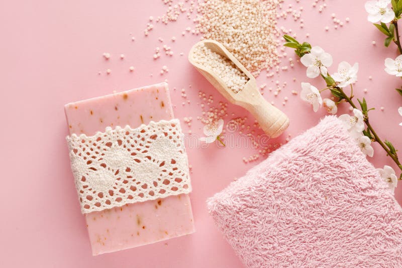 Pink spa set: bar of handmade soap, sea salt and towel.
