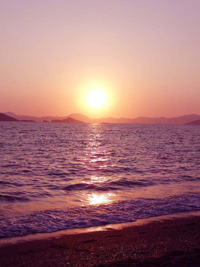 Pink sunset in mediterranean sea